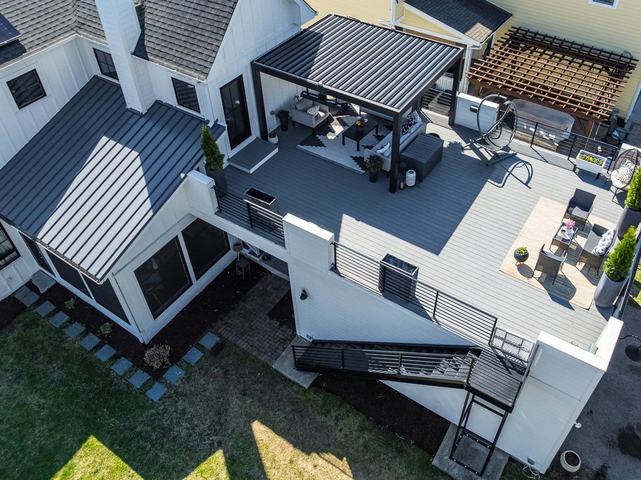 Naperville IL elevated Trex composite deck with a free-standing pergola.
