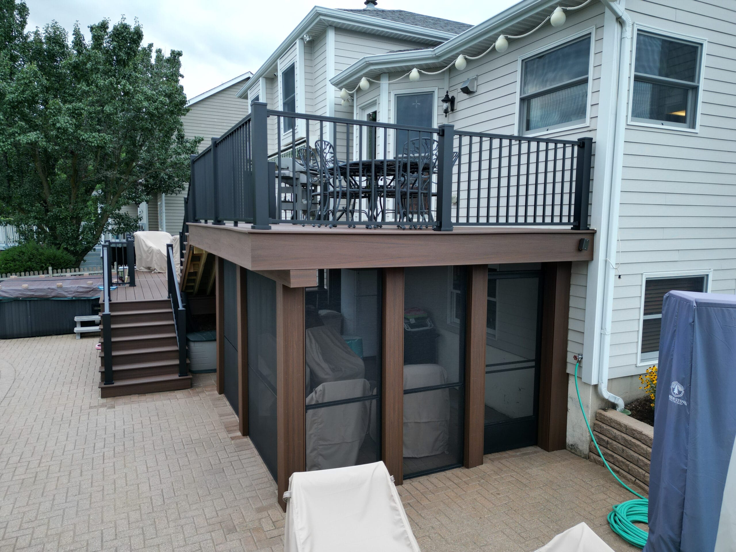 Screened-in deck skirting Trex decking.
