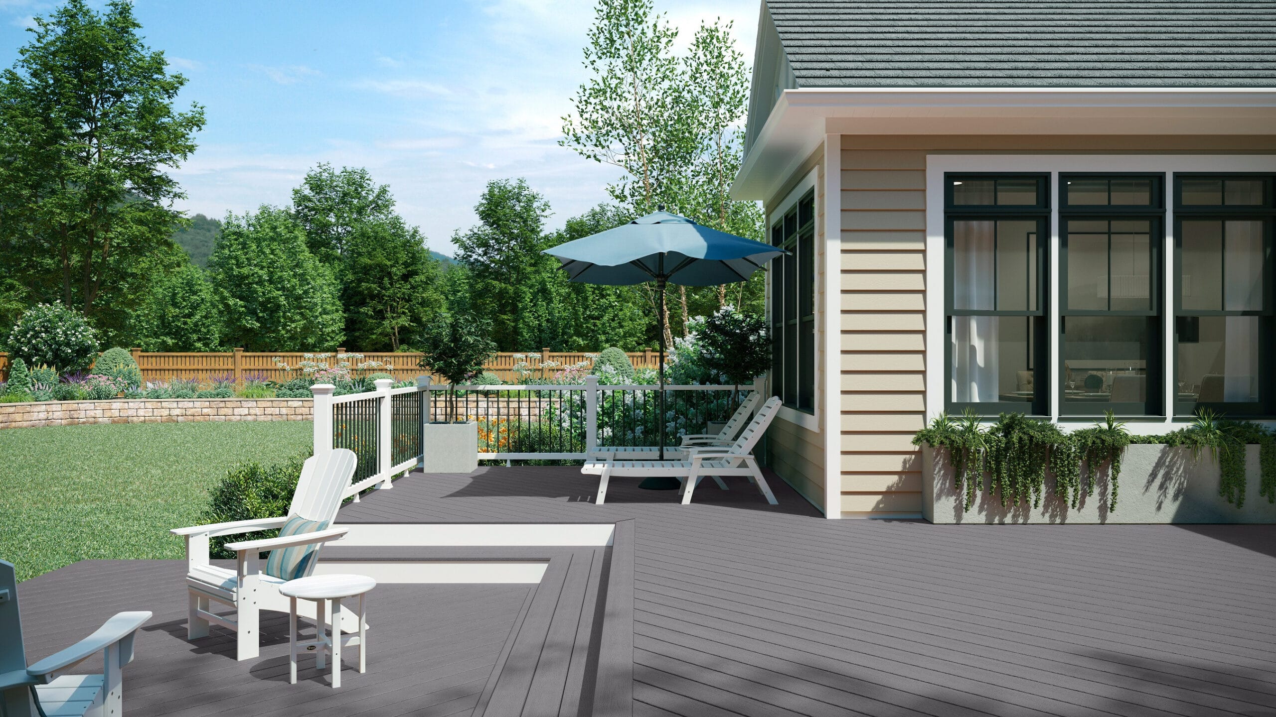 Outdoor deck built with Trex Enhance Pebble Beach decking, featuring soft gray boards with natural wood-grain texture, white railings and fascia, and a relaxing lounge chair with an umbrella.