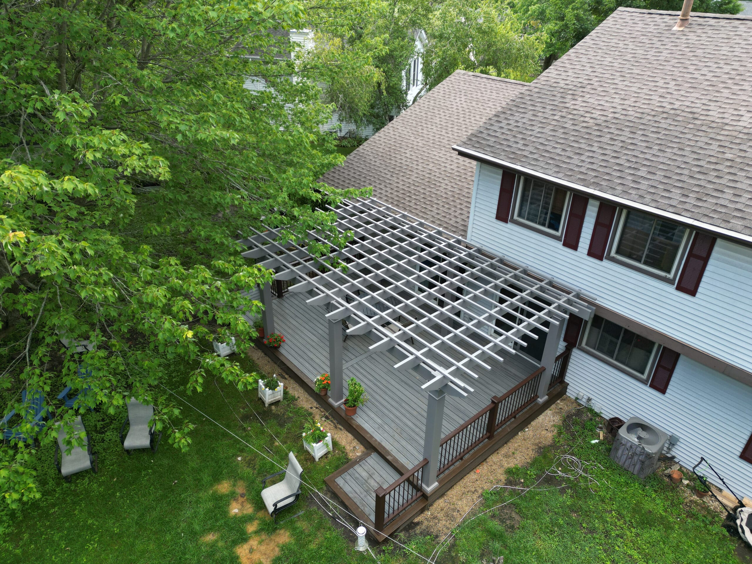Fiberglass pergola on top of composite decking.