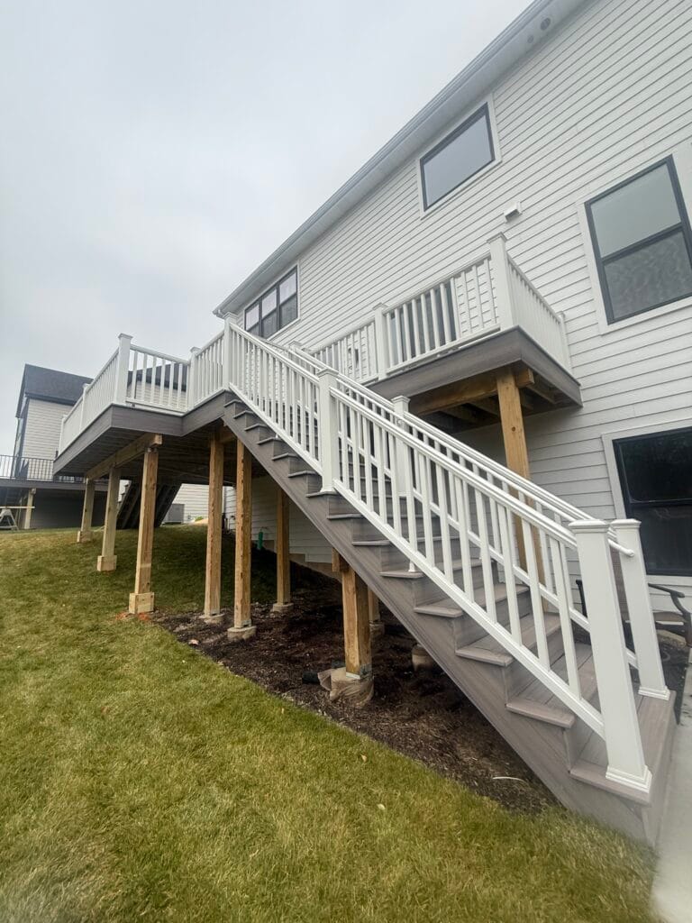 Finished Trex® composite deck in Lemont, IL, extended with added helical piers for foundation support.