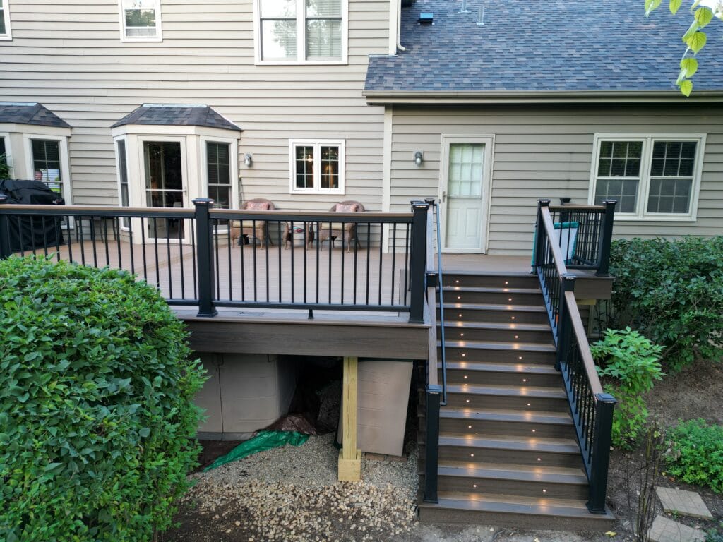 Deck with integrated lighting, showcasing ambient illumination and Trex® composite decking.