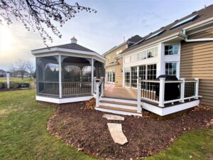 composite deck integrated with a screen gazebo