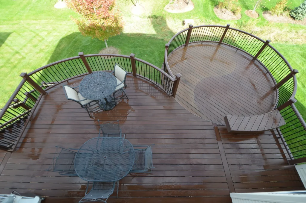 Trex Enhance® Beach Dune composite deck with curved two tier design and matching railings built by Warners Decking in Lemont IL