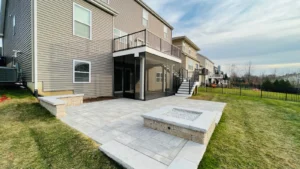 Patio with balcony deck & screened under deck area.