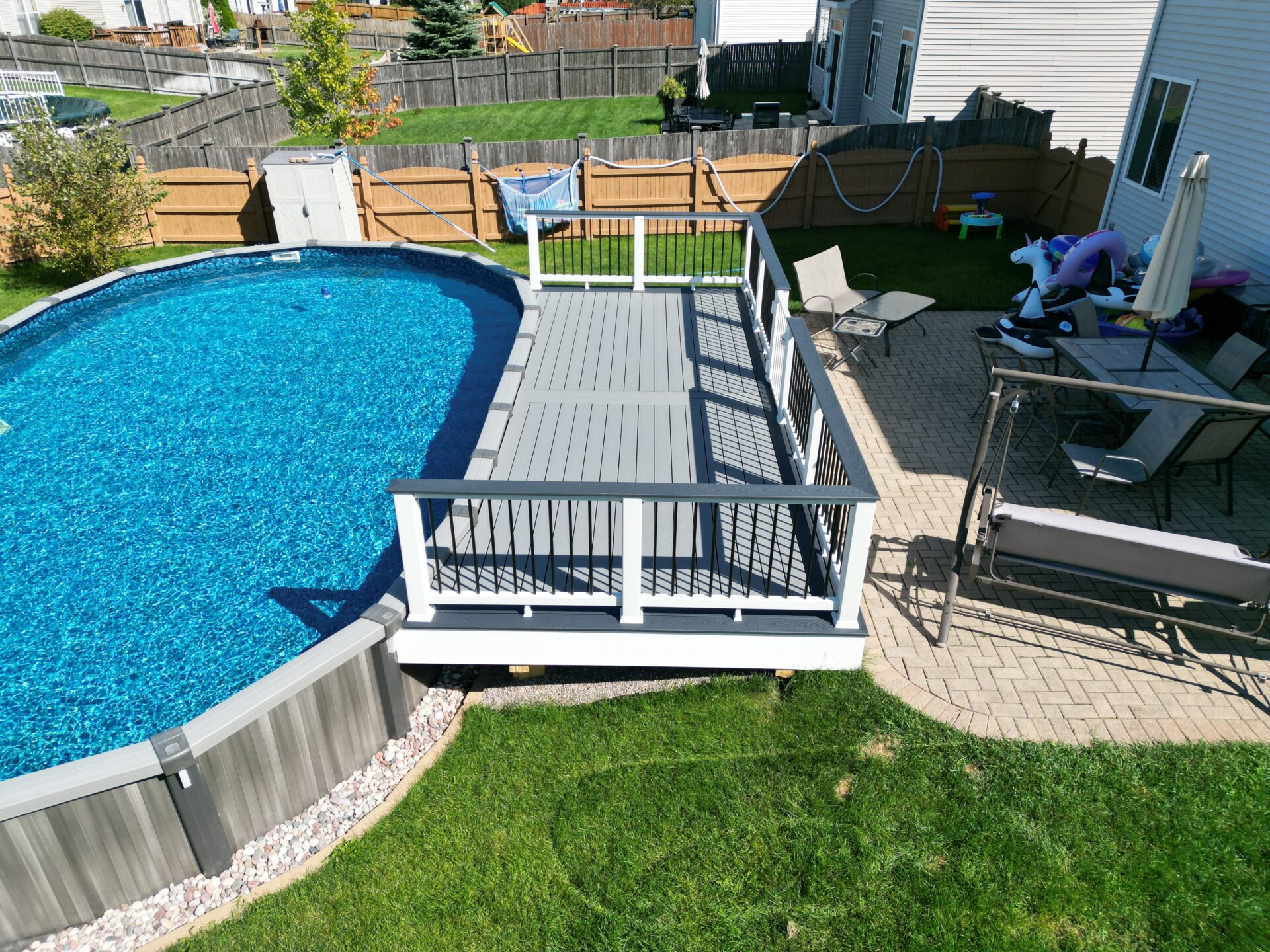Trex composite pool deck with slip-resistant textured surface in Chicago, IL.