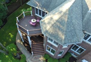 Multi-level composite deck with balcony installed in the Chicago area.