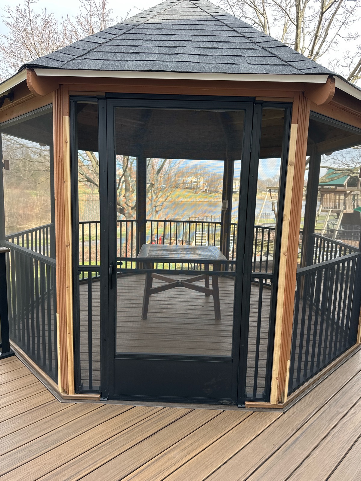 Screened gazebo with a deck resurface completed in Lisle, IL.
