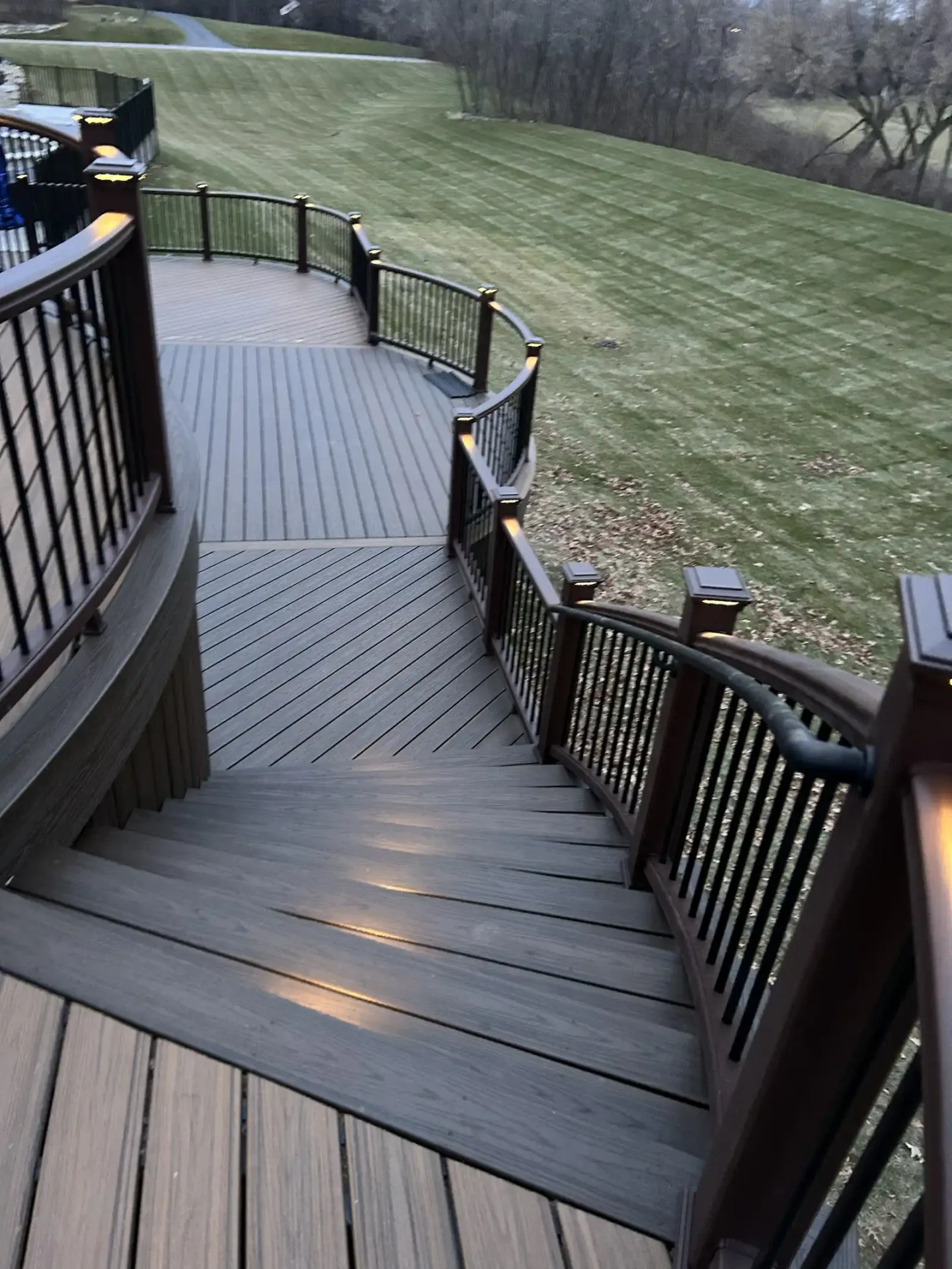 multi-level-trex-deck-with-custom-curves custom curved Trex deck in Chicago, IL.