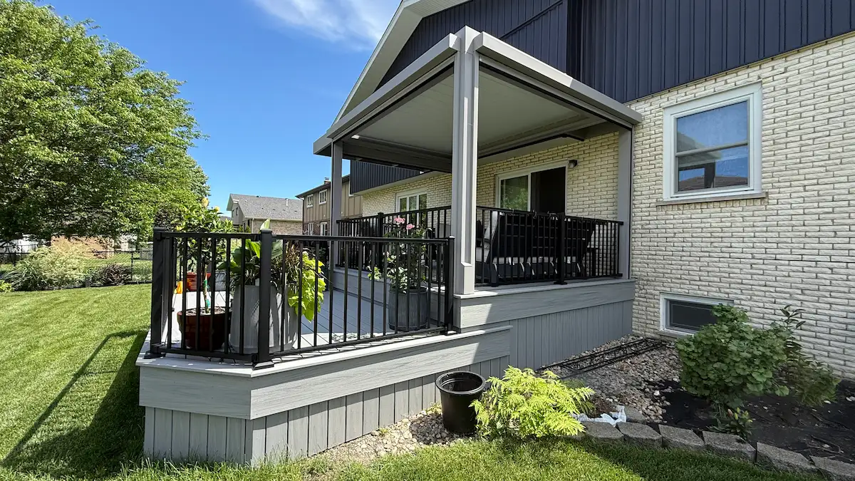 motorized-louvered-roof-pergola-installed-in-homer-glen-il smart louvered roof pergola installed on top of a custom composite deck in Homer Glen, Illinois by Warner's Decking.