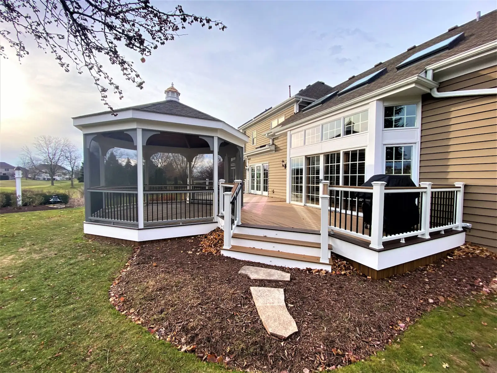 Trex deck with a screened gazebo.
