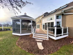 composite deck integrated with a screened gazebo