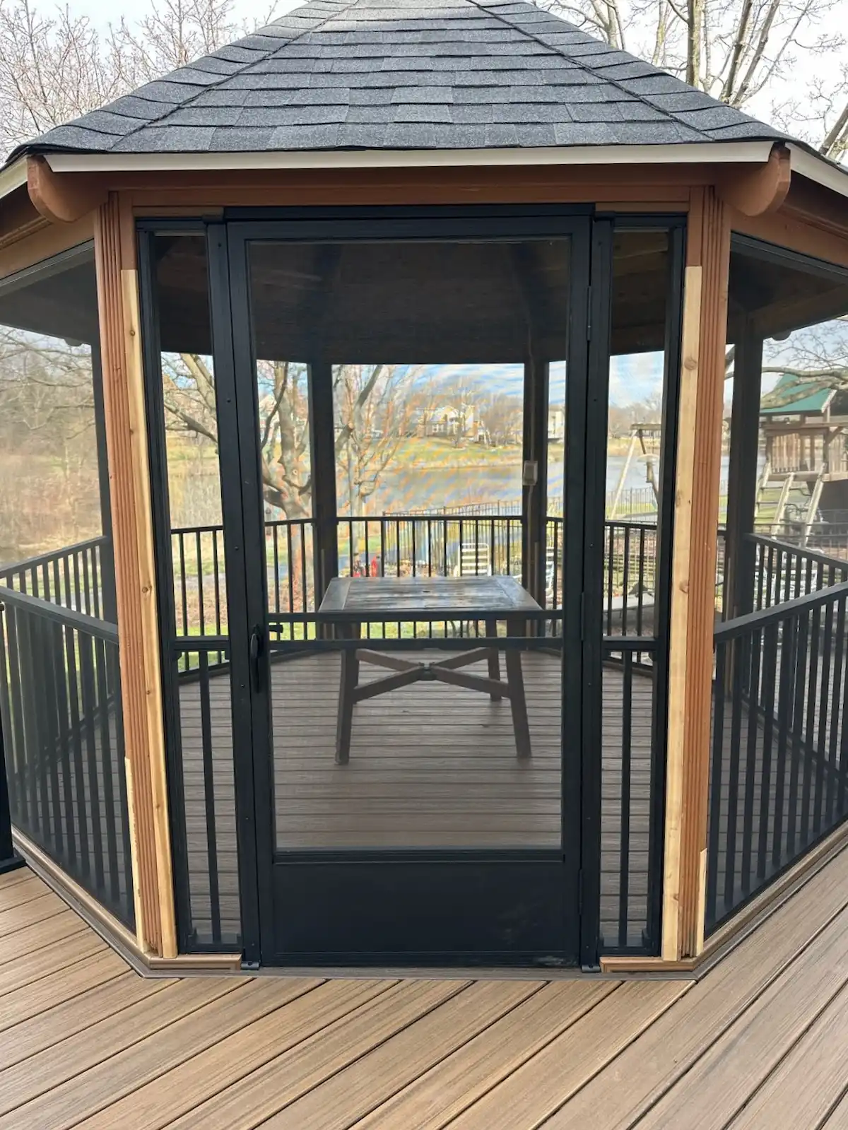 trex-deck-installation-integrated-screened-gazebo Screened gazebo with a deck resurface completed in Lisle, IL.