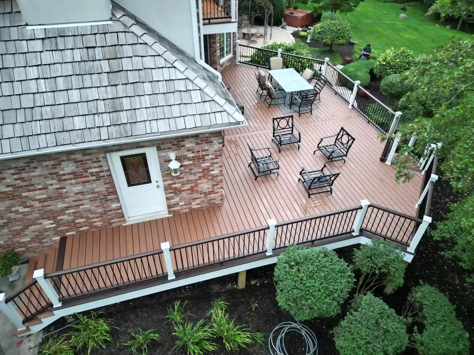Worn deck upgraded with new Trex Transcend composite decking in Shorewood, Illinois